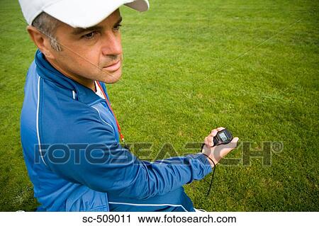Trainer with timer View Large Photo Image Stock Image - Trainer with timer. Fotosearch