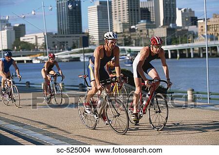 Triathloners Cycling View Large Photo Image Picture - Triathloners Cycling. Fotosearch