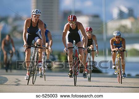 Triathloners Cycling View Large Photo Image Stock Image - Triathloners Cycling. Fotosearch