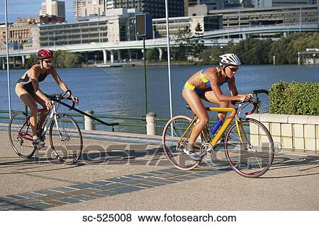 Triathloners Cycling View Large Photo Image Stock Photo - Triathloners Cycling. Fotosearch