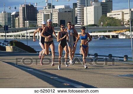 Triathloners Running View Large Photo Image Stock Image - Triathloners Running. Fotosearch