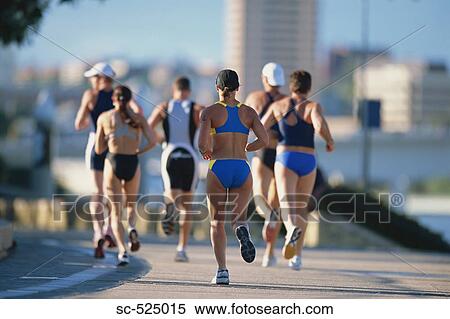 Stock Photography - Triathloners Running. Fotosearch