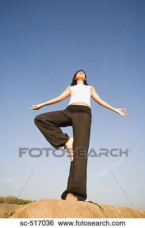 Stock Photograph - Woman Doing Yoga. Fotosearch