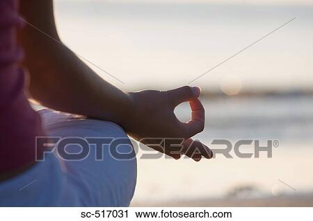 Woman Meditating On the Beach View Large Photo Image Stock Image - Woman Meditating On the Beach. Fotosearch