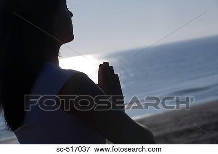 Woman Meditating On the Beach View Large Photo Image Stock Photo - Woman Meditating On the Beach. Fotosearch