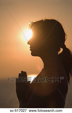 Stock Photo - Woman Meditating. Fotosearch