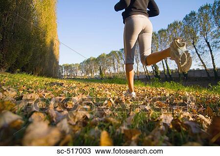 Stock Image - Woman Running. Fotosearch