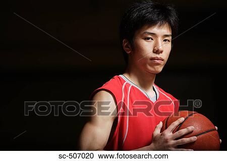 Young Asian basketball player View Large Photo Image Stock Image - Young Asian basketball player. Fotosearch