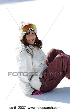 Stock Photo - Young Asian woman in snow. Fotosearch