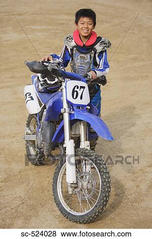 Stock Photo - Young Motocrosser. Fotosearch