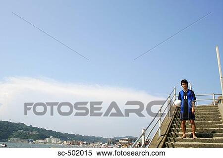 Young Soccer Player Sitting On a Flight of Stairs View Large Photo Image Stock Photography - Young Soccer Player Sitting On a Flight of Stairs. Fotosearch