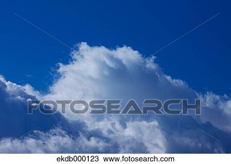 Blue sky with clouds View Large Photo Image Stock Image - Blue sky with clouds. Fotosearch