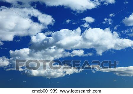 Blue sky with clouds View Large Photo Image Stock Photo - Blue sky with clouds. Fotosearch