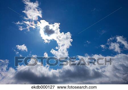 Blue sky with clouds View Large Photo Image Stock Photo - Blue sky with clouds. Fotosearch