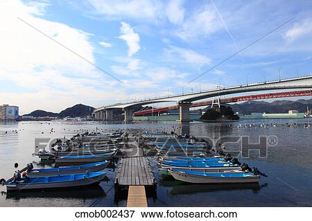 Boats and Konaruto Bridge, Tokushima Prefecture View Large Photo Image Stock Photo - Boats and Konaruto Bridge, Tokushima Prefecture. Fotosearch