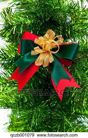 Stock Photo - Christmas tree with ribbon. Fotosearch