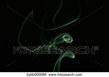 Stock Photo - Green smoke on black background. Fotosearch
