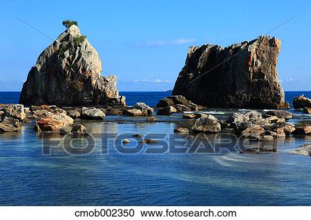 Hashikuiiwa rock formation in Kushimoto, Wakayama Prefecture View Large Photo Image Stock Image - Hashikuiiwa rock formation in Kushimoto, Wakayama Prefecture. Fotosearch