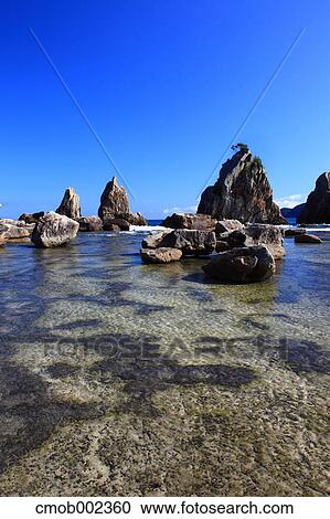 Hashikuiiwa rock formation in Kushimoto, Wakayama Prefecture View Large Photo Image Stock Image - Hashikuiiwa rock formation in Kushimoto, Wakayama Prefecture. Fotosearch