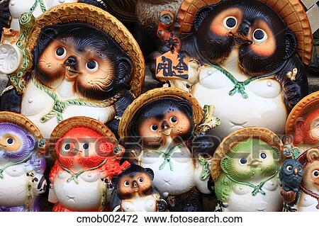 Stock Image - Japanese traditional raccoon statues. Fotosearch
