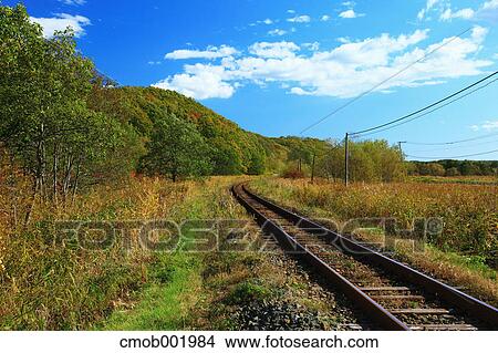 Railway in the countryside in Kushiro, Hokkaido View Large Photo Image Picture - Railway in the countryside in Kushiro, Hokkaido. Fotosearch