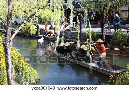 Stock Image - River boat in Kurashiki, Okayama Prefecture. Fotosearch