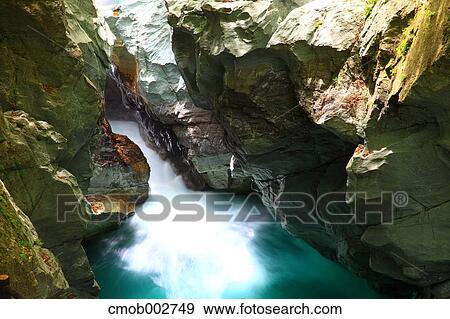 Rocks and flowing water, Tokushima Prefecture View Large Photo Image Stock Photo - Rocks and flowing water, Tokushima Prefecture. Fotosearch