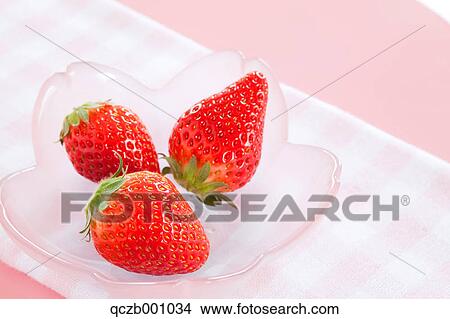 Picture - Strawberries on a glass plate. Fotosearch