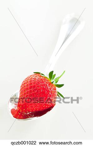 Stock Image - Strawberry on a spoon. Fotosearch