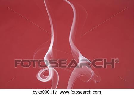 Stock Photo - White smoke on red background. Fotosearch