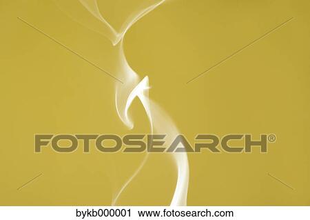 Stock Image - White smoke on yellow background. Fotosearch