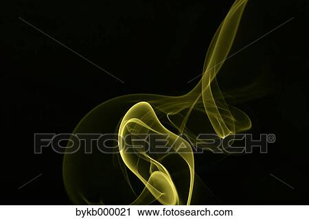 Stock Image - Yellow smoke on black background. Fotosearch