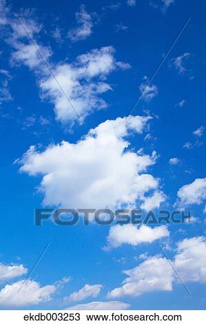 Blue sky with clouds View Large Photo Image Stock Image - Blue sky with clouds. Fotosearch