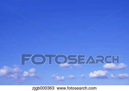 Stock Image - Blue sky with clouds. Fotosearch