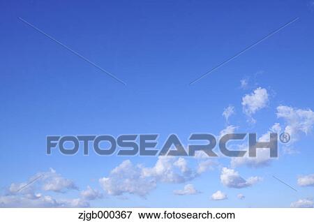 Blue sky with clouds View Large Photo Image Stock Photo - Blue sky with clouds. Fotosearch