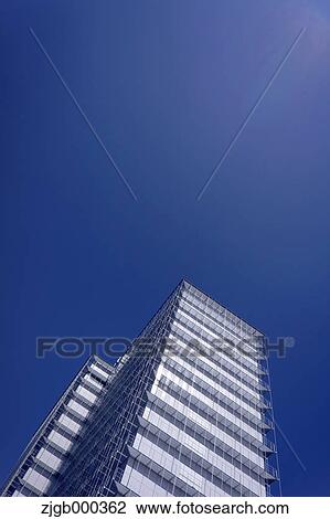 Building and blue sky View Large Photo Image Stock Image - Building and blue sky. Fotosearch