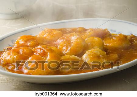 Picture - Chinese style chilli stir-fried shrimps. Fotosearch