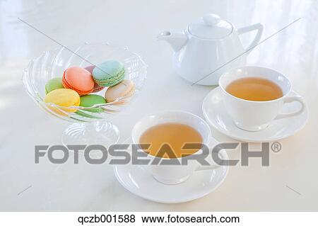 Herbal tea and macaroons View Large Photo Image Stock Photo - Herbal tea and macaroons. Fotosearch