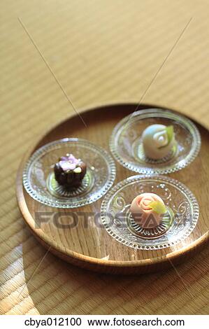 Japanese confectionery on a wooden plate View Large Photo Image Stock Image - Japanese confectionery on a wooden plate. Fotosearch