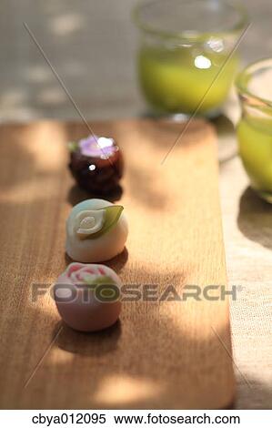 Japanese confectionery on a wooden plate View Large Photo Image Stock Photography - Japanese confectionery on a wooden plate. Fotosearch