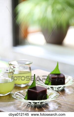 Stock Photography - Japanese sweets and drinks on a table. Fotosearch