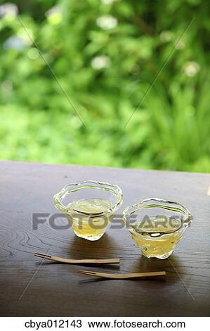 Japanese sweets and wooden forks on a table View Large Photo Image Stock Image - Japanese sweets and wooden forks on a table. Fotosearch