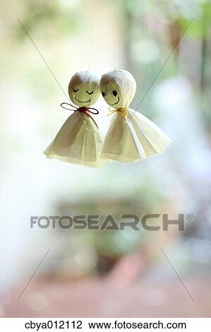 Stock Image - Japanese weather paper dolls. Fotosearch