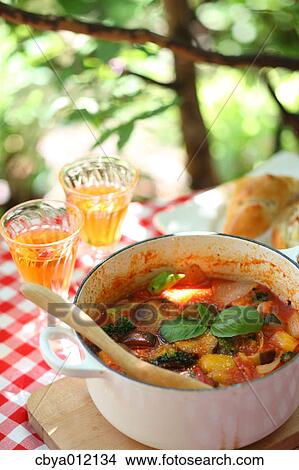 Ratatouille and drinks on a table View Large Photo Image Picture - Ratatouille and drinks on a table. Fotosearch