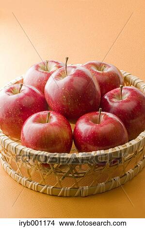 Red apples in a wooden basket View Large Photo Image Picture - Red apples in a wooden basket. Fotosearch