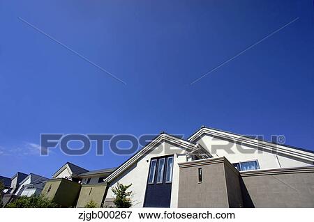 Stock Photo - Residential area and blue sky. Fotosearch