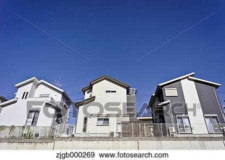Residential area and blue sky View Large Photo Image Stock Photo - Residential area and blue sky. Fotosearch