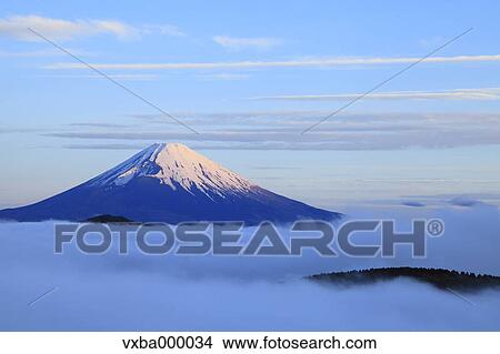 Sea of??clouds and morning glow at Mount Fuji View Large Photo Image Picture - Sea of??clouds and morning glow at Mount Fuji. Fotosearch