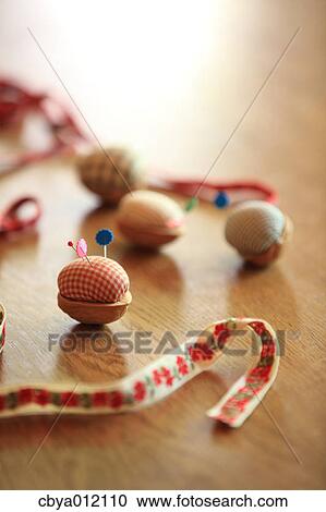 Sewing tools on a wooden floor View Large Photo Image Stock Image - Sewing tools on a wooden floor. Fotosearch