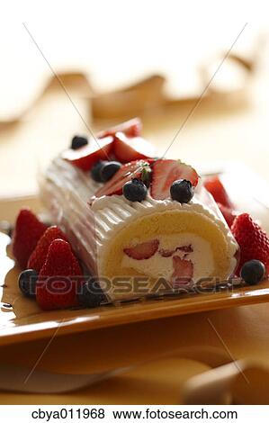 Strawberry roll cake on a plate View Large Photo Image Stock Photo - Strawberry roll cake on a plate. Fotosearch